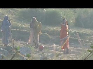 Desi granny changing after bath on river